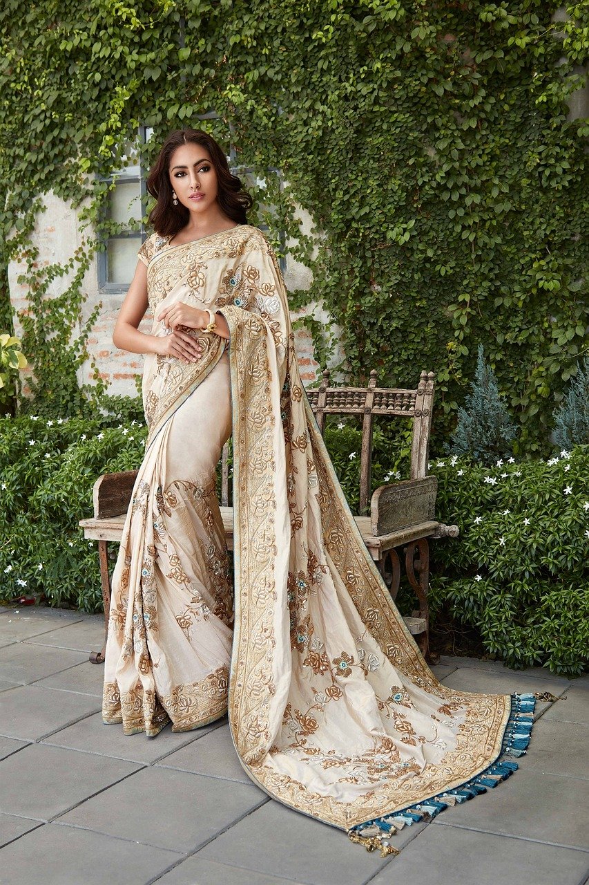 An off white embroidery Silk saree